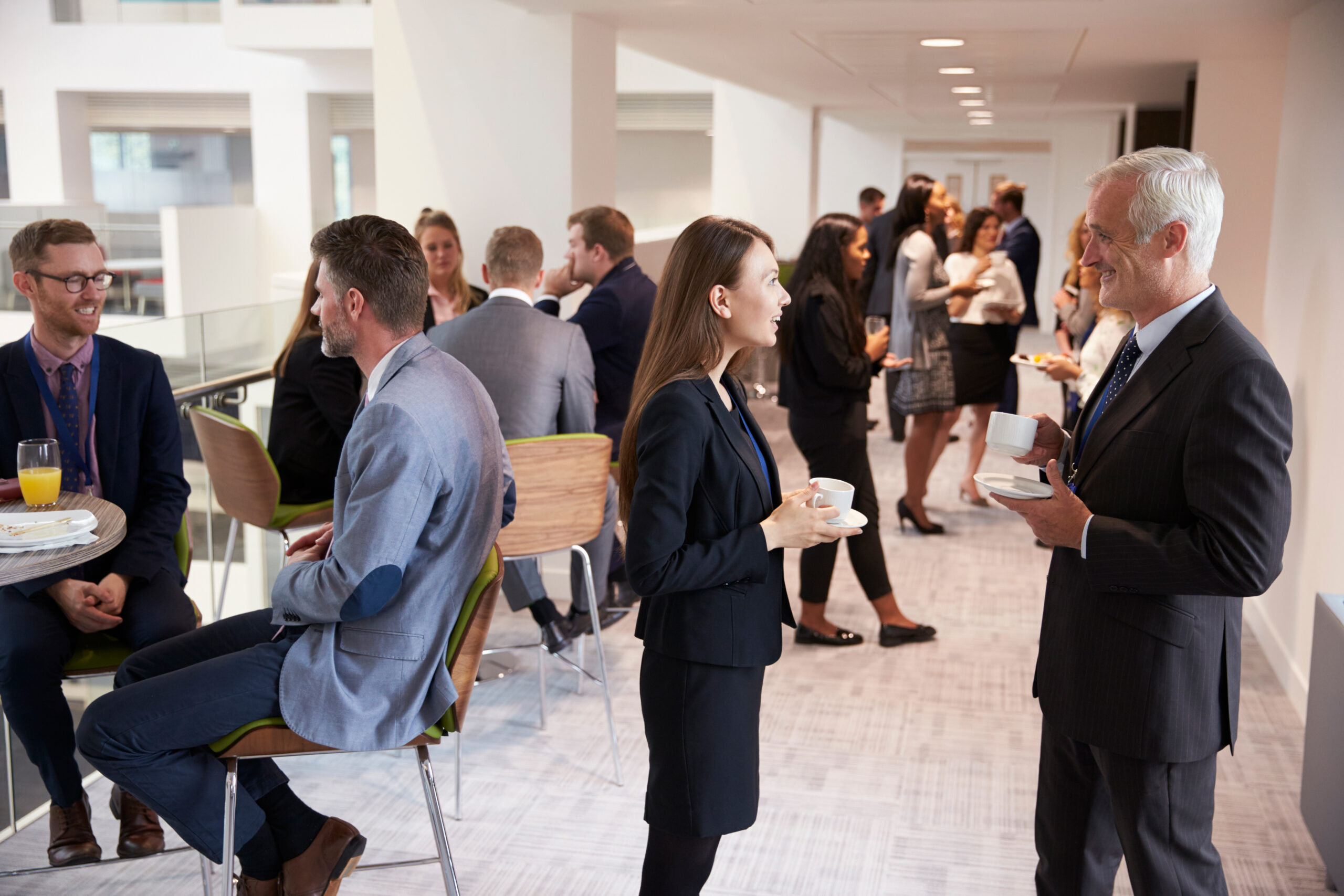 delegates-networking-during-coffee-break-at-confer-2023-11-27-05-09-43-utc